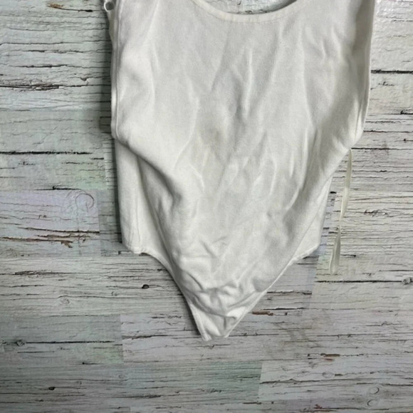 White by the way. Revolve bodysuit size small - Picture 2 of 7